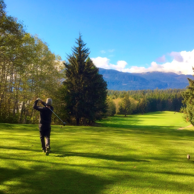 Golfer teeing off at Hirsch Creek
